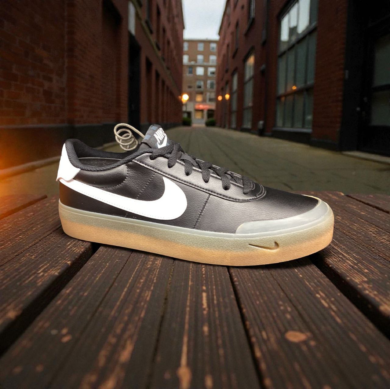 Court Shot shoe in black synthetic leather.
